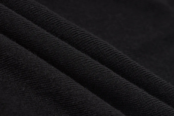 An image of a   31031 Layered Knit Top by  Mirra Masa