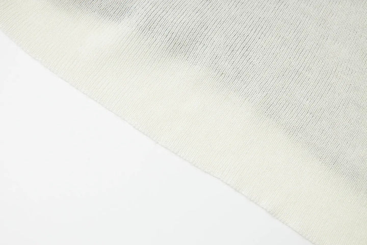 An image of a   31031 Layered Knit Top by  Mirra Masa