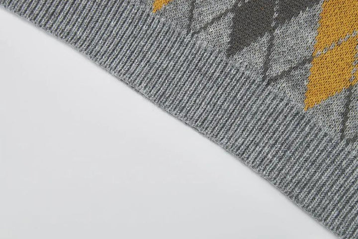 An image of a   31063 Argyle Knit Sweater Vest by  Mirra Masa