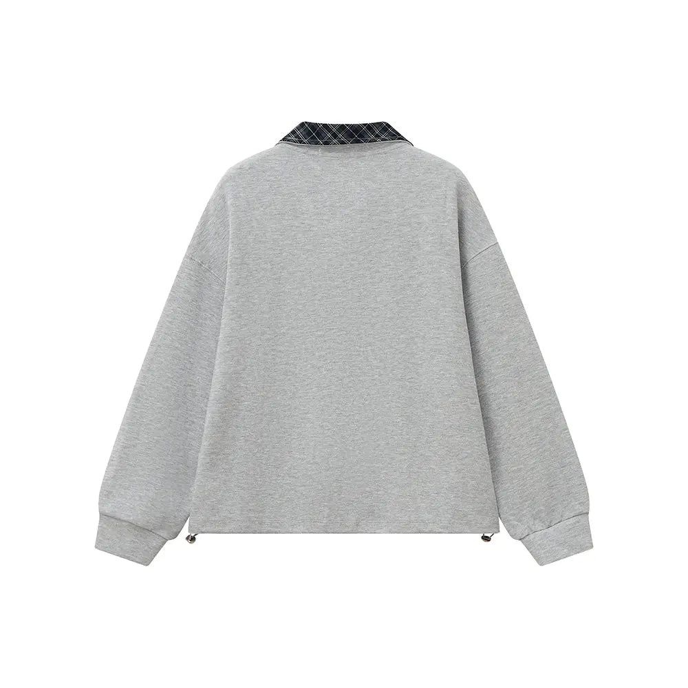 An image of a   31106 Plaid Collar Half-Zip Pullover by  Mirra Masa