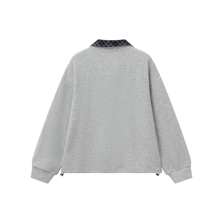 An image of a   31106 Plaid Collar Half-Zip Pullover by  Mirra Masa