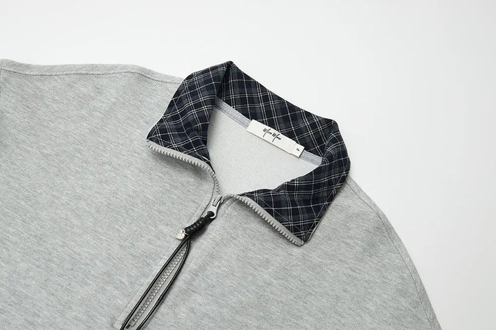 An image of a   31106 Plaid Collar Half-Zip Pullover by  Mirra Masa