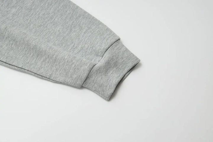 An image of a   31106 Plaid Collar Half-Zip Pullover by  Mirra Masa