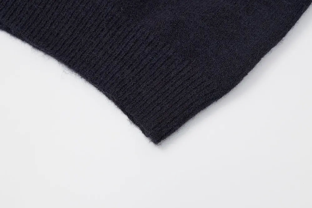 An image of a   31167 Knit Vest with Shoulder Sweater by  Mirra Masa