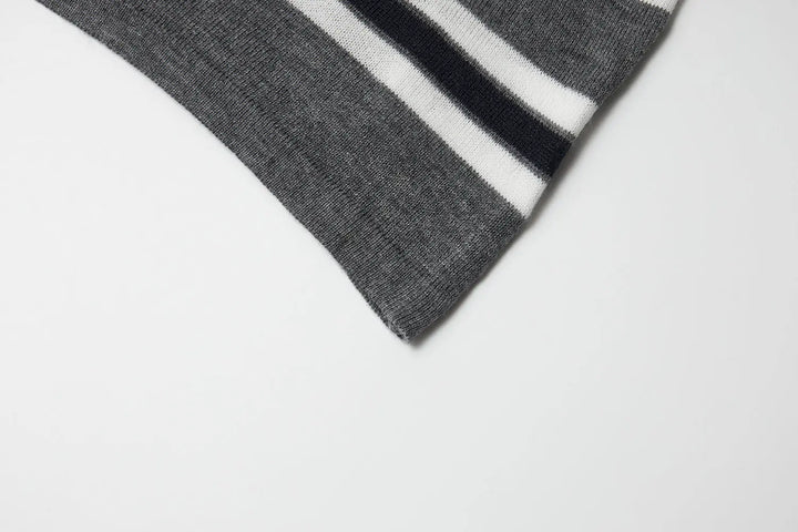 An image of a   31192 Striped Long Sleeve Knit Top by  Mirra Masa
