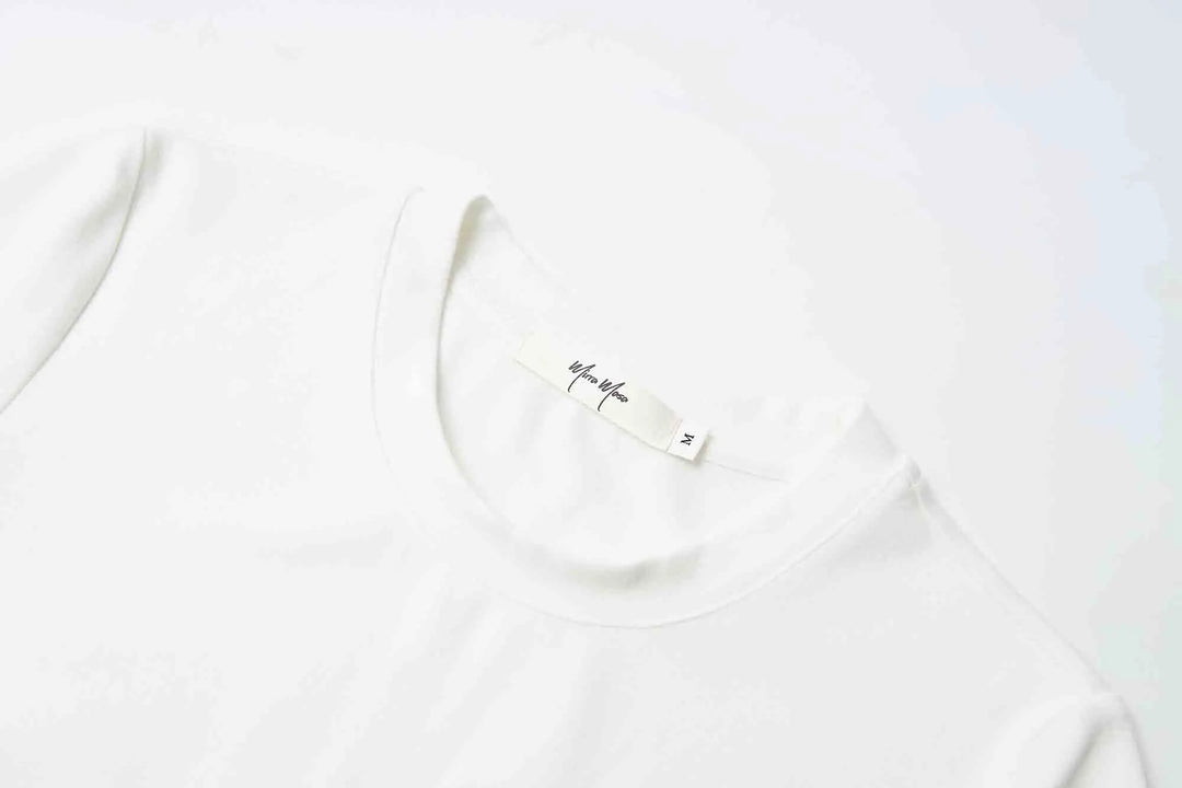 An image of a   31304 Bow Charmed T-Shirt by  Mirra Masa