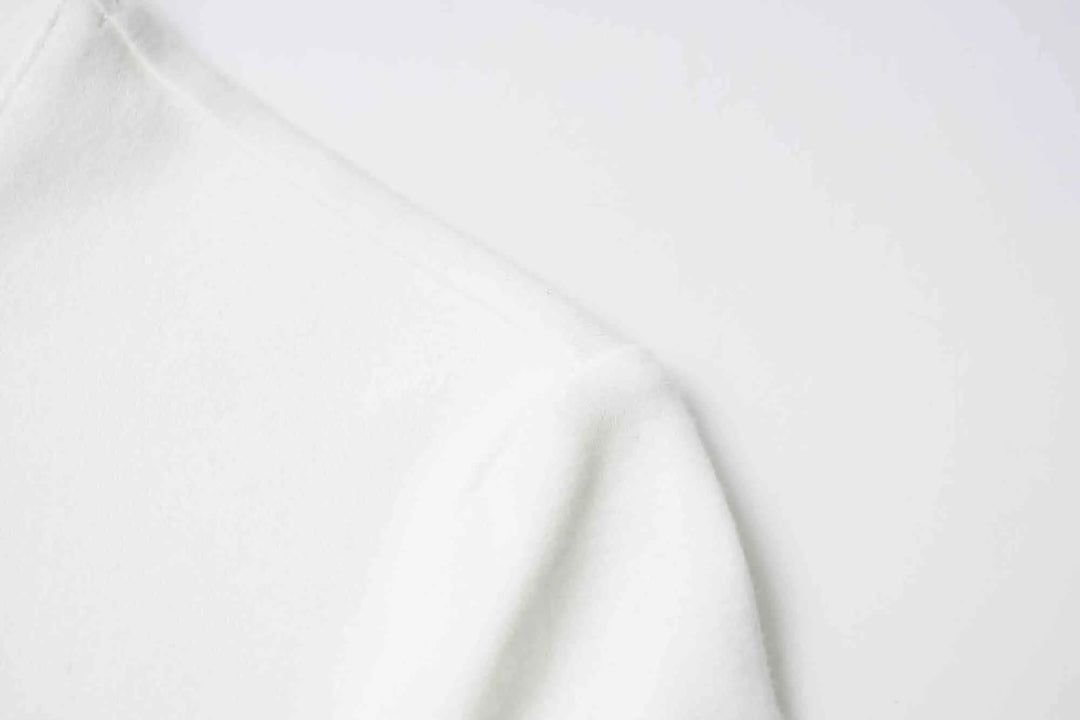 An image of a   31304 Bow Charmed T-Shirt by  Mirra Masa