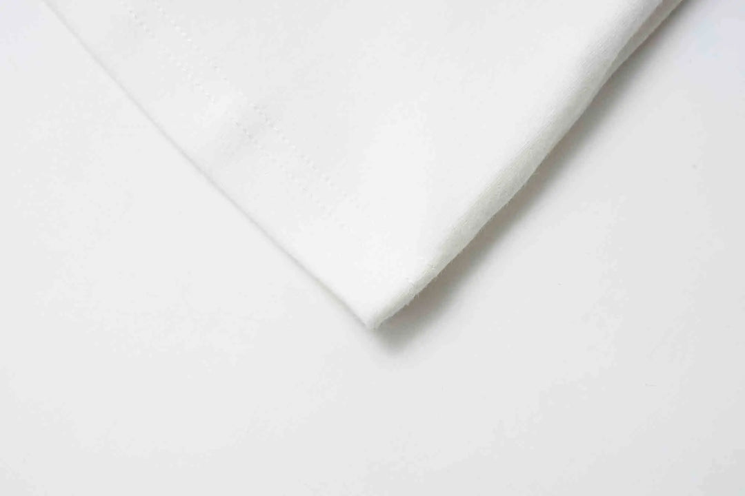 An image of a   31304 Bow Charmed T-Shirt by  Mirra Masa