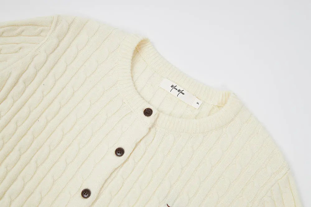 An image of a   31308 Cable Knit Cardigan by  Mirra Masa