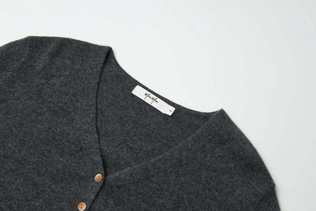 An image of a   31309 V-Neck Wool Cardigan by  Mirra Masa