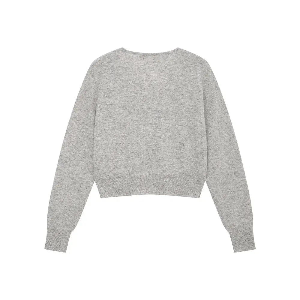An image of a   31309 V-Neck Wool Cardigan by  Mirra Masa