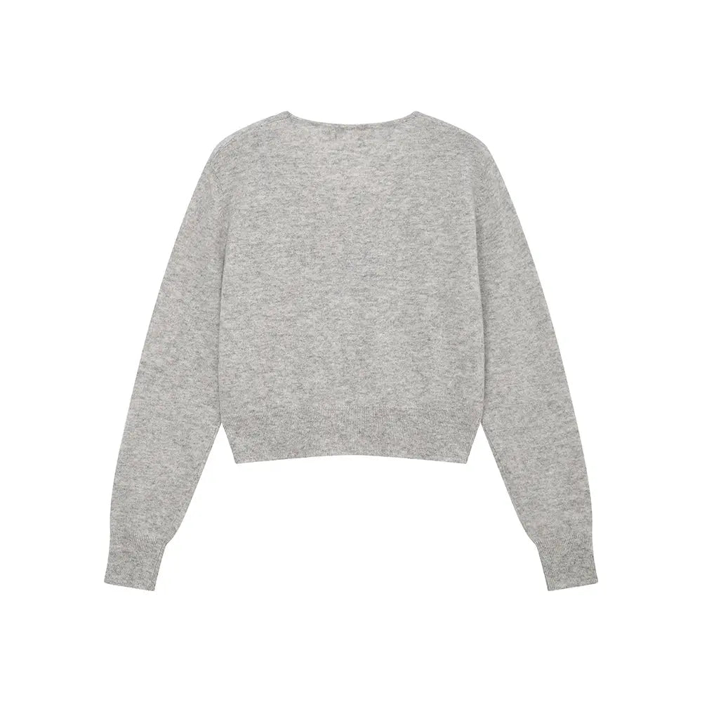 An image of a   31309 V-Neck Wool Cardigan by  Mirra Masa