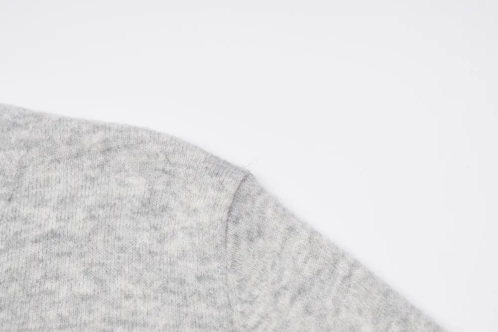 An image of a   31309 V-Neck Wool Cardigan by  Mirra Masa