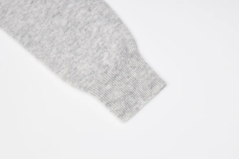 An image of a   31309 V-Neck Wool Cardigan by  Mirra Masa