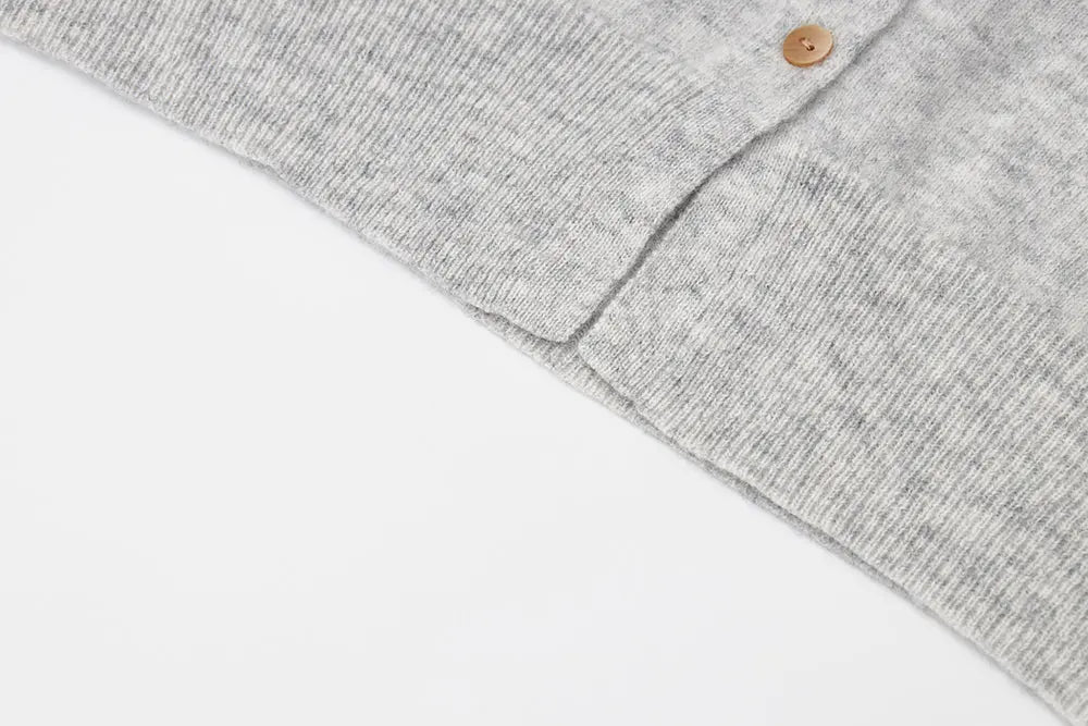 An image of a   31309 V-Neck Wool Cardigan by  Mirra Masa