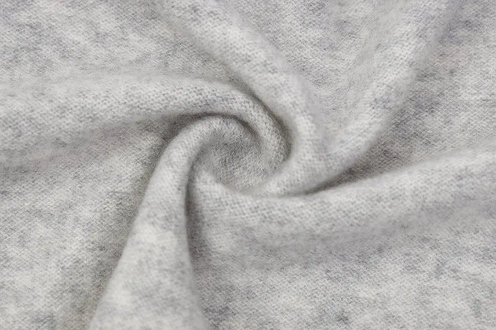 An image of a   31309 V-Neck Wool Cardigan by  Mirra Masa