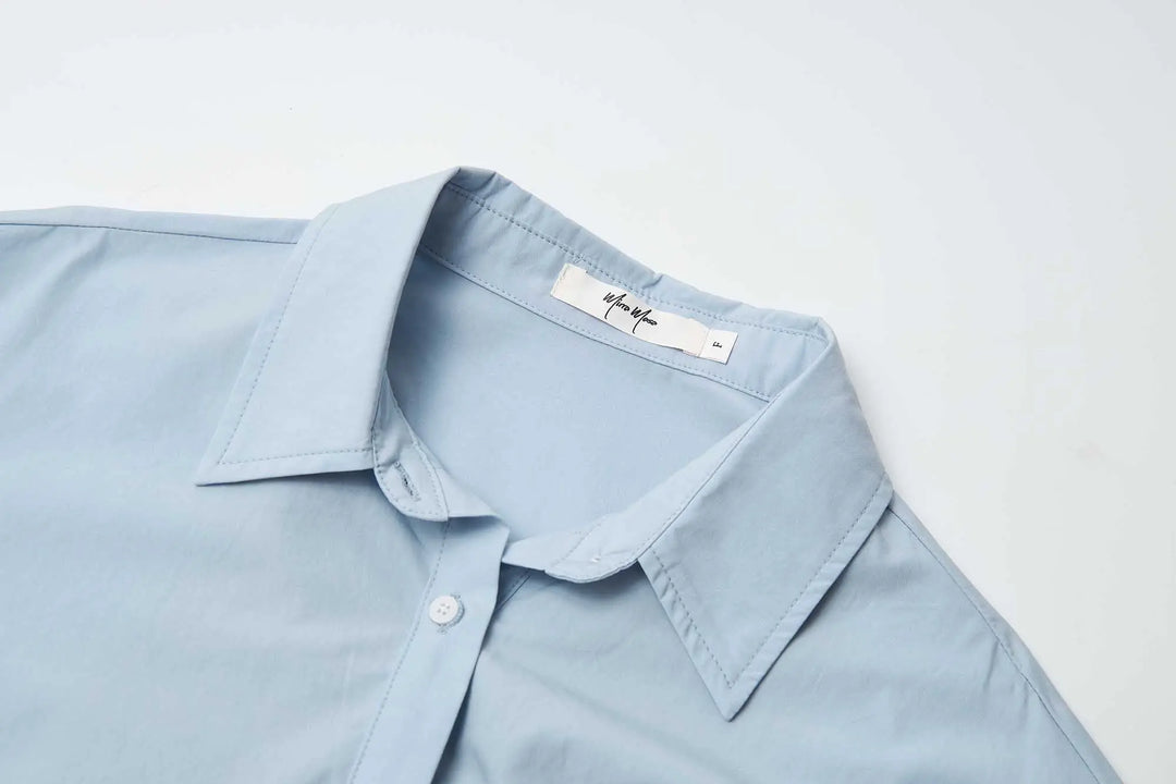 An image of a   31364 Tucked and Cropped Layered Shirt by  Mirra Masa