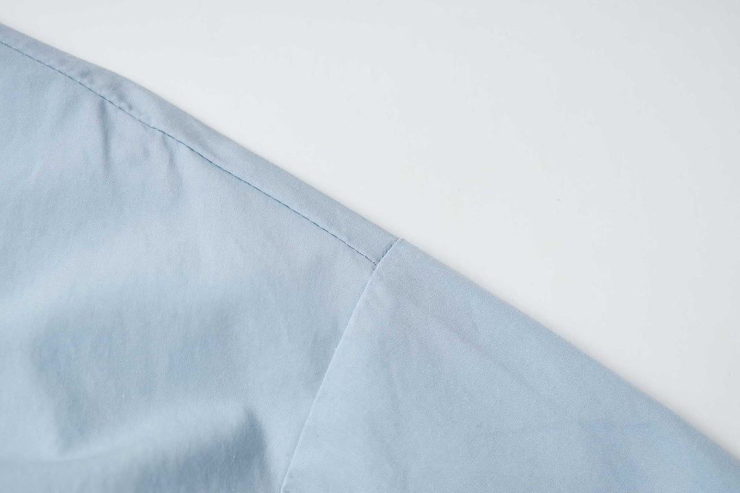 An image of a   31364 Tucked and Cropped Layered Shirt by  Mirra Masa