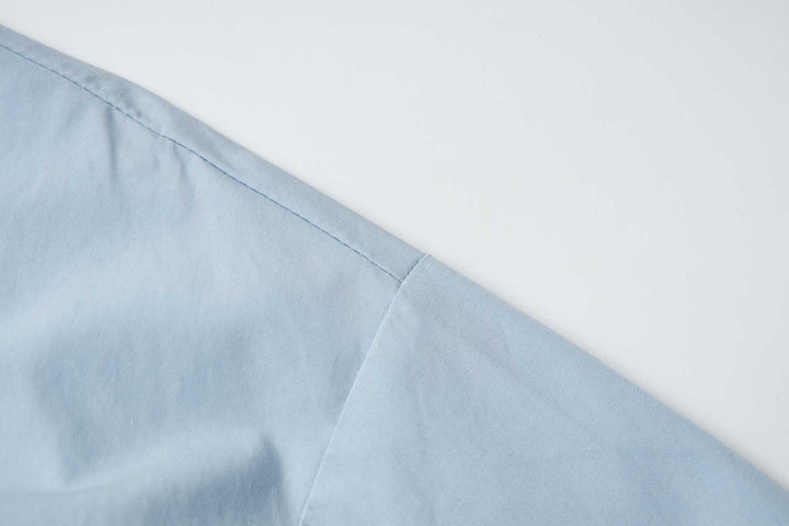 An image of a   31364 Tucked and Cropped Layered Shirt by  Mirra Masa