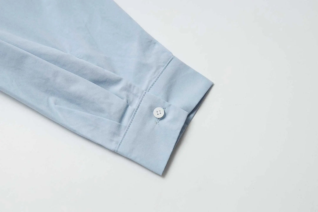 An image of a   31364 Tucked and Cropped Layered Shirt by  Mirra Masa