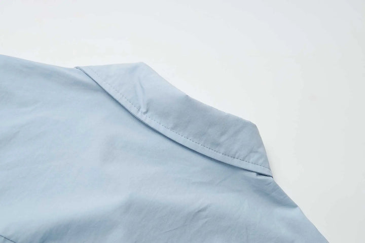An image of a   31364 Tucked and Cropped Layered Shirt by  Mirra Masa