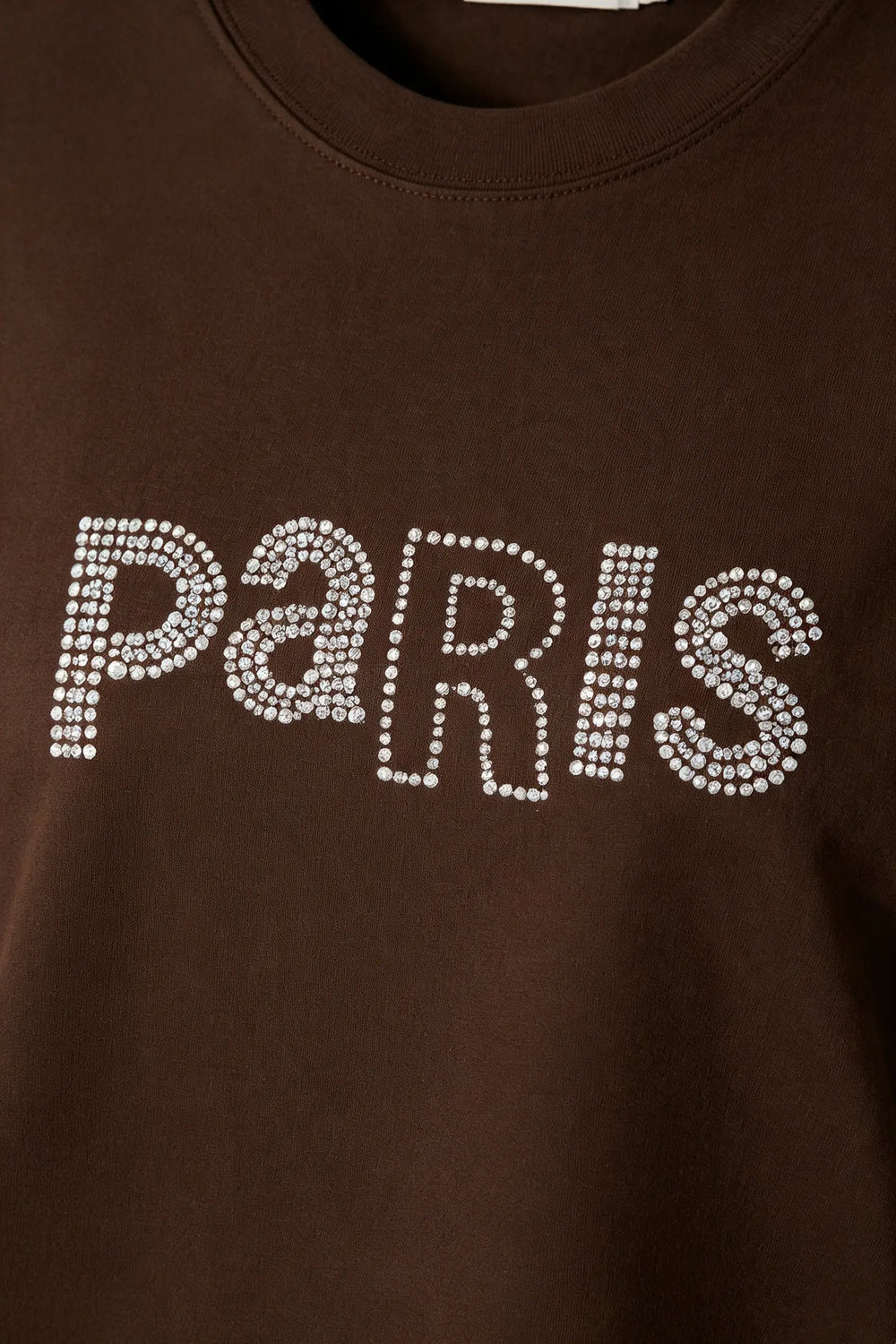An image of a   31382 Rhinestone Graphic Tee by  Mirra Masa