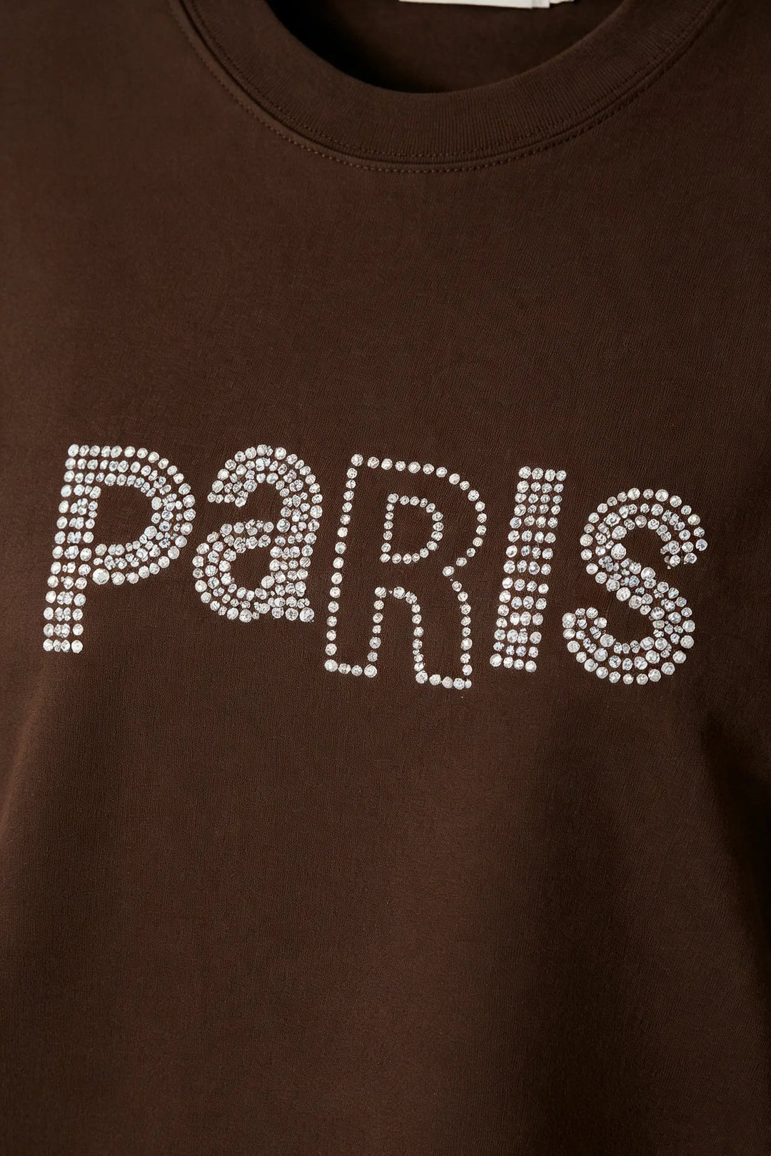 An image of a   31382 Rhinestone Graphic Tee by  Mirra Masa