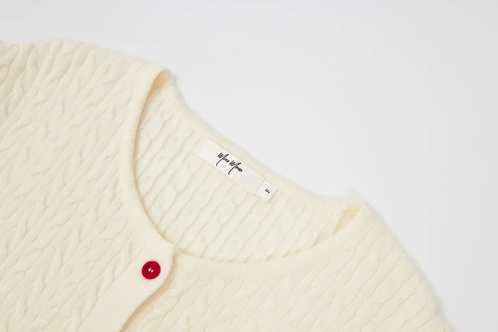 An image of a   31467 Knitwear with Colored Buttons by  Mirra Masa