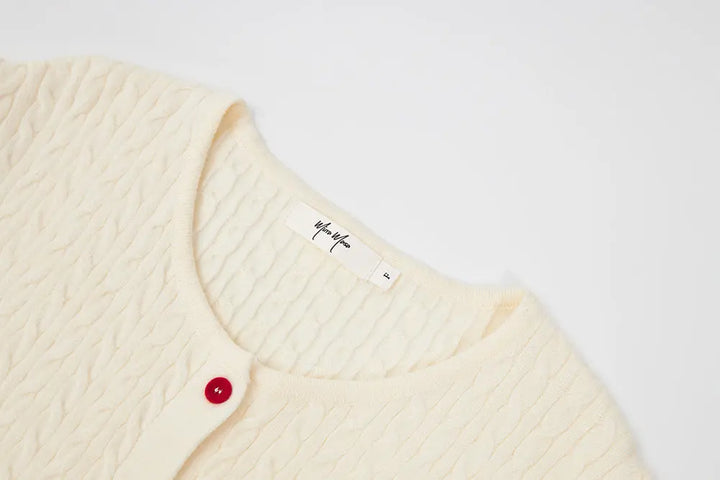 An image of a   31467 Knitwear with Colored Buttons by  Mirra Masa