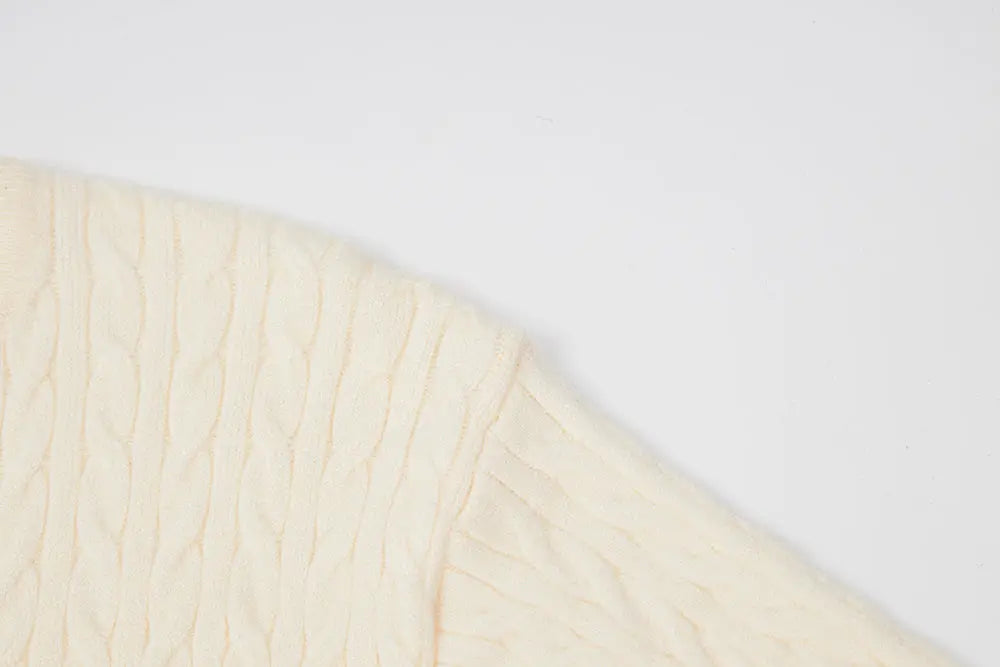 An image of a   31467 Knitwear with Colored Buttons by  Mirra Masa