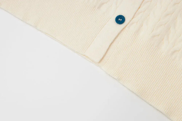 An image of a   31467 Knitwear with Colored Buttons by  Mirra Masa