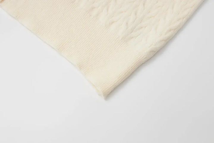An image of a   31467 Knitwear with Colored Buttons by  Mirra Masa