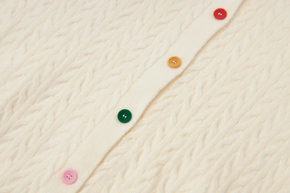 An image of a   31467 Knitwear with Colored Buttons by  Mirra Masa