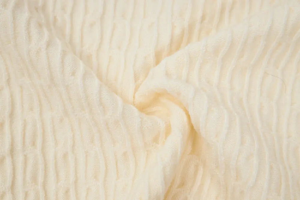 An image of a   31467 Knitwear with Colored Buttons by  Mirra Masa