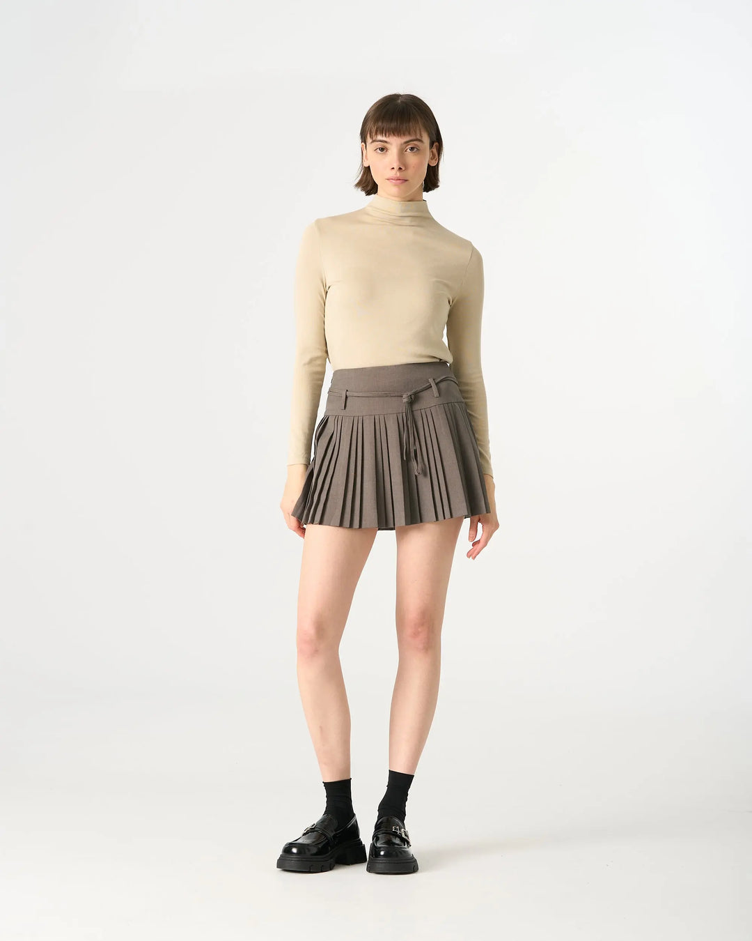 An image of a  Beige / One-Size 31513 Mockneck Top by  Mirra Masa