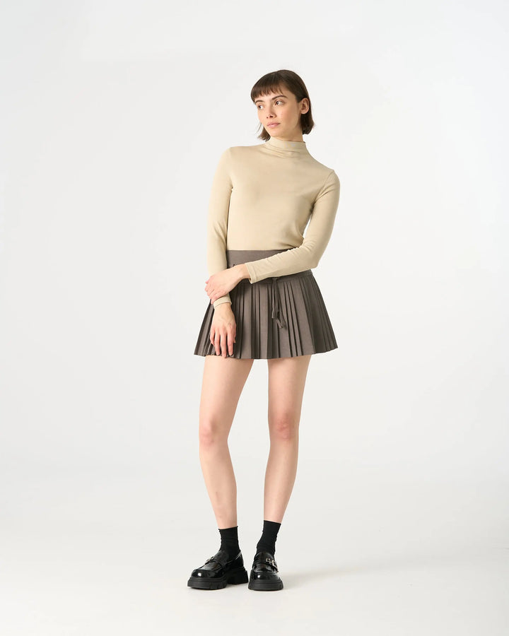 An image of a   31513 Mockneck Top by  Mirra Masa