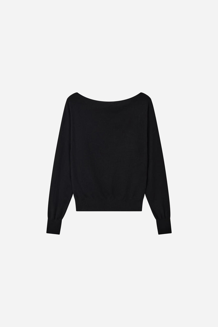 An image of a   31569 Off-Shoulder Knit Top by  Mirra Masa
