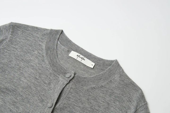 An image of a   31573 Classic Button-Front Knit Top by  Mirra Masa