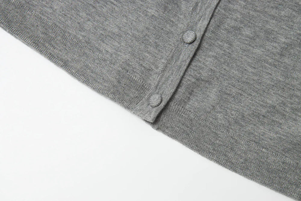 An image of a   31573 Classic Button-Front Knit Top by  Mirra Masa