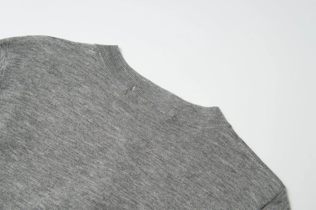 An image of a   31573 Classic Button-Front Knit Top by  Mirra Masa
