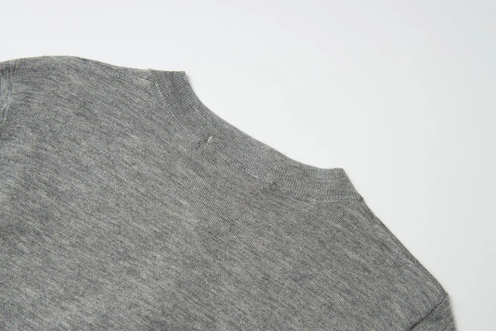 An image of a   31573 Classic Button-Front Knit Top by  Mirra Masa