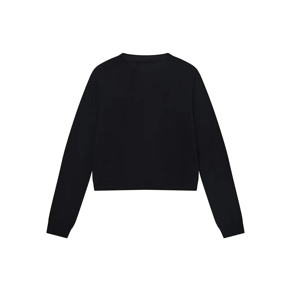 An image of a   31573 Classic Button-Front Knit Top by  Mirra Masa