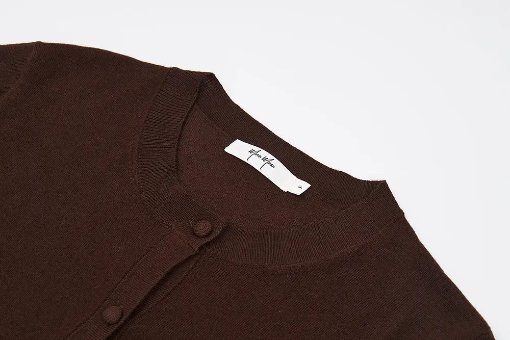 An image of a   31573 Classic Button-Front Knit Top by  Mirra Masa