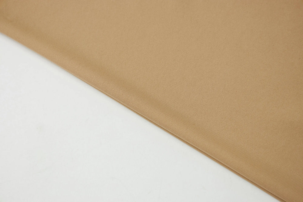 An image of a   31588 Cropped Slip Top by  Mirra Masa