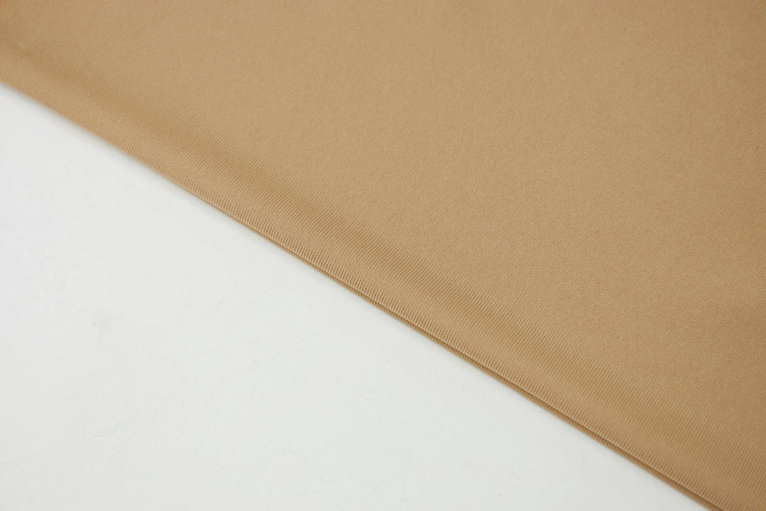 An image of a   31588 Cropped Slip Top by  Mirra Masa