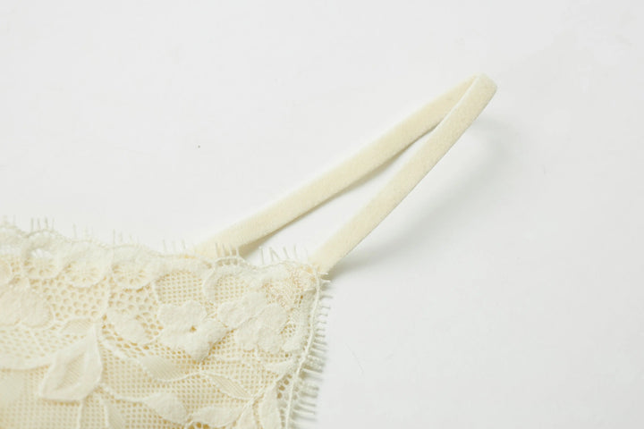 An image of a   31603 Laced Slip Top by  Mirra Masa