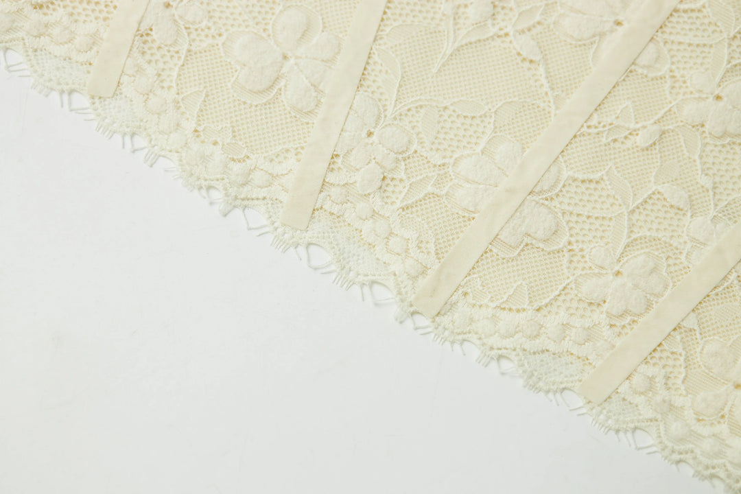 An image of a   31603 Laced Slip Top by  Mirra Masa
