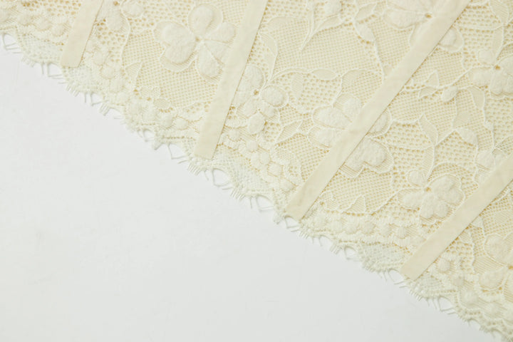 An image of a   31603 Laced Slip Top by  Mirra Masa