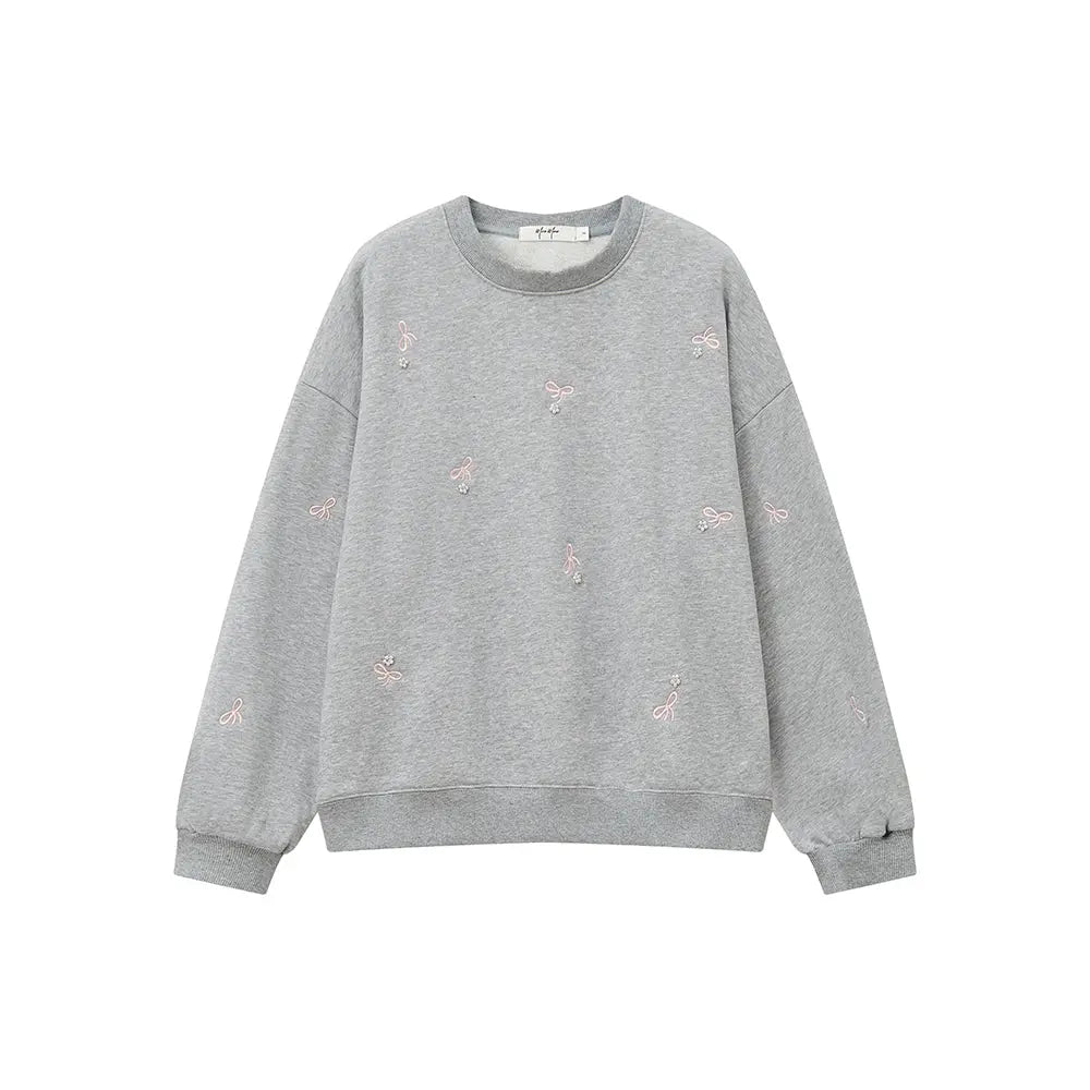 An image of a   31729 Bow Embroidered Crewneck Sweatshirt by  Mirra Masa