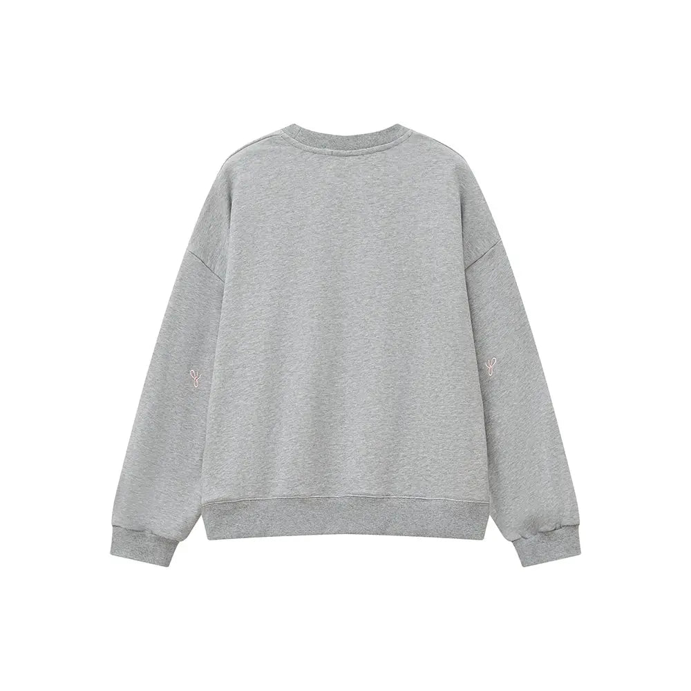 An image of a   31729 Bow Embroidered Crewneck Sweatshirt by  Mirra Masa
